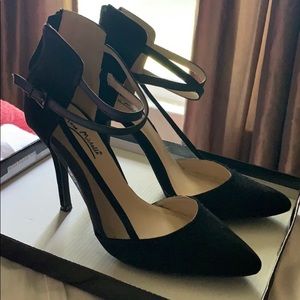 Black suede pumps